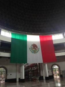 Image 4. The central foyer of the Archivo General de la Nación, with a massive dome in the place of the old prison watchtower and the Mexican flag centrally positioned as one enters the space (taken by the author in 2015).